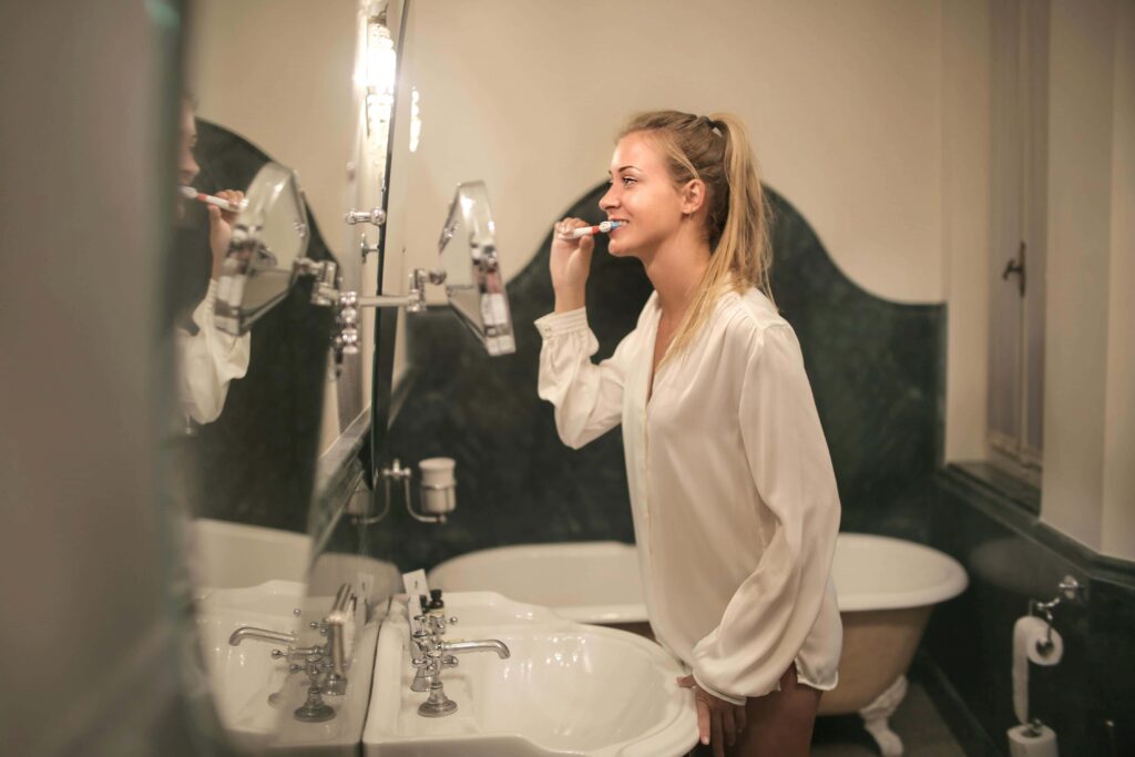 woman overbrushing