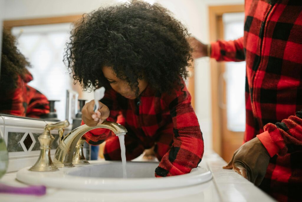 kid brushing teeth