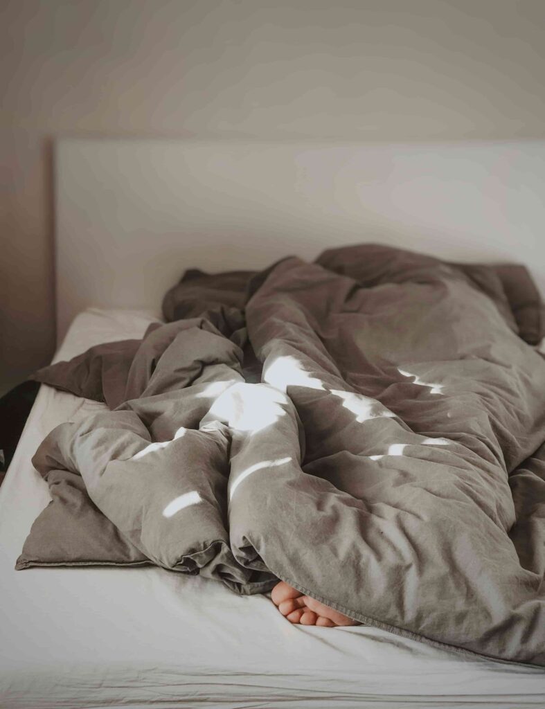 Understanding Your Rest: How Sleep Apnea Impacts Your Life 3 person in bed trying to sleep